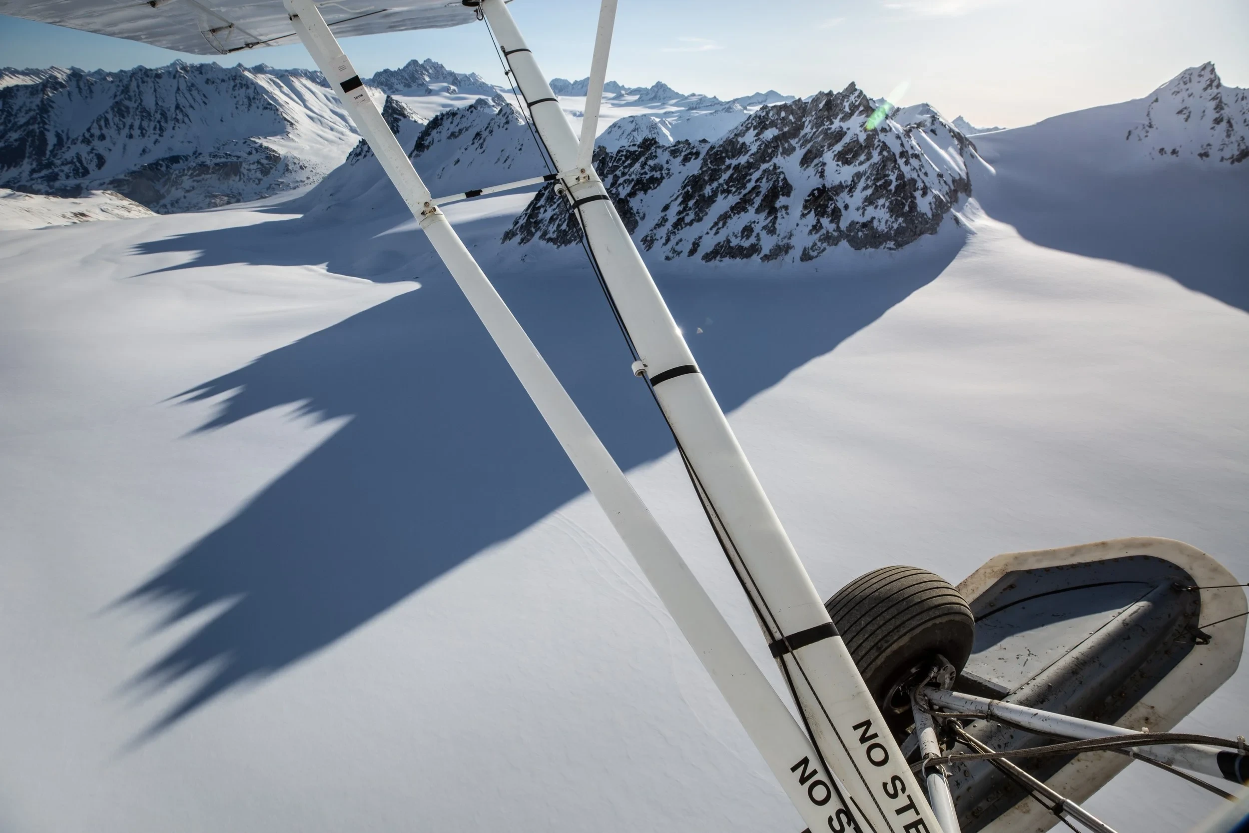 A Super Cub flies over the Talkeetna Mountains.