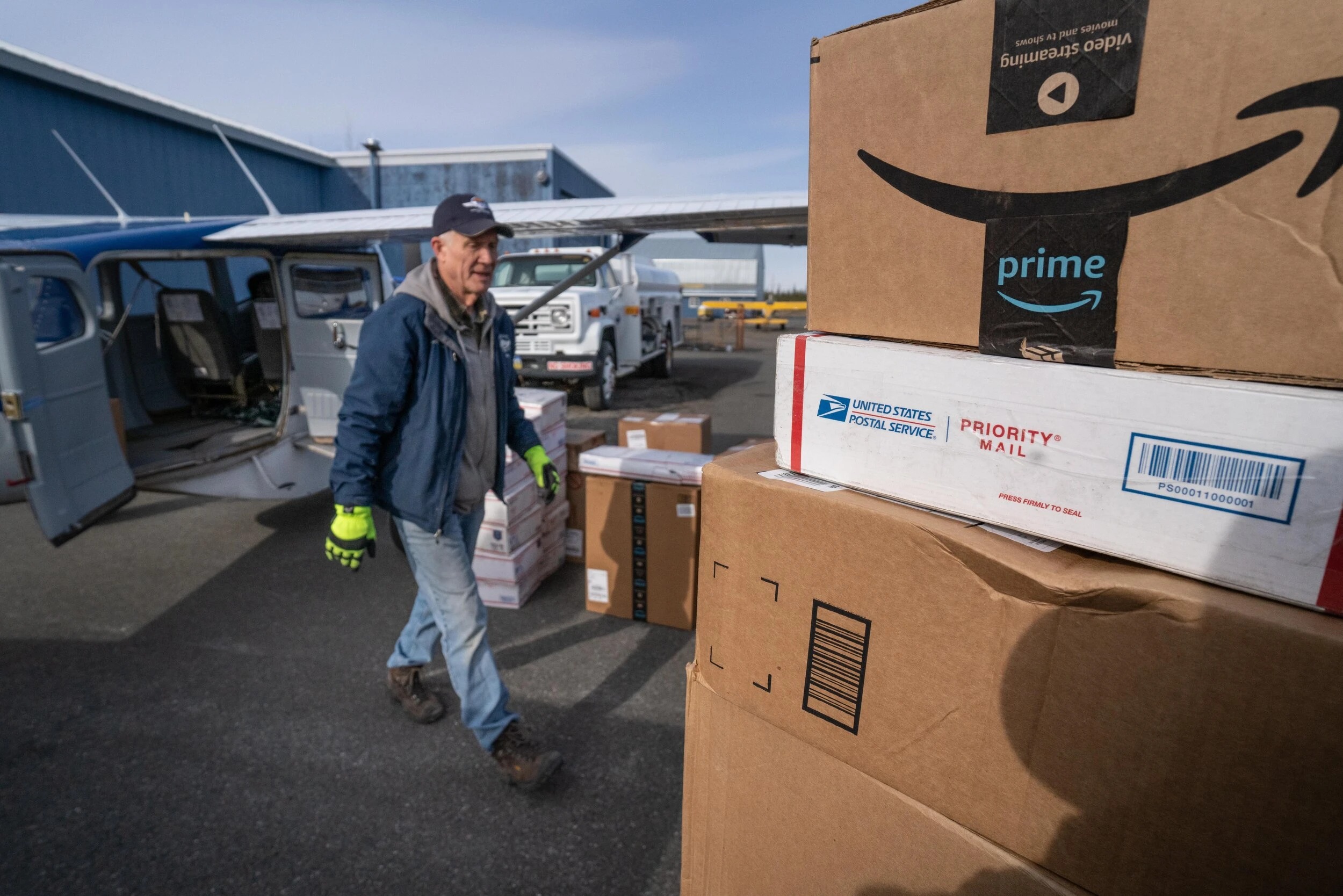 Rick Snow loading the mail plane for McCarthy. Gulkana Airport, Alaska.