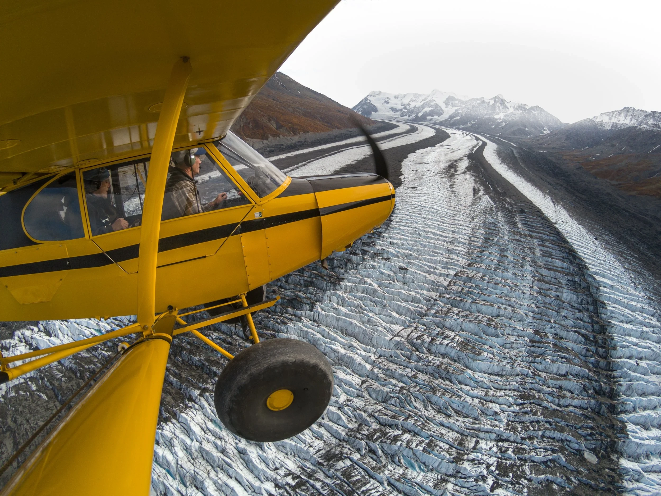 An aerial photo from a small airplane cockpit.
